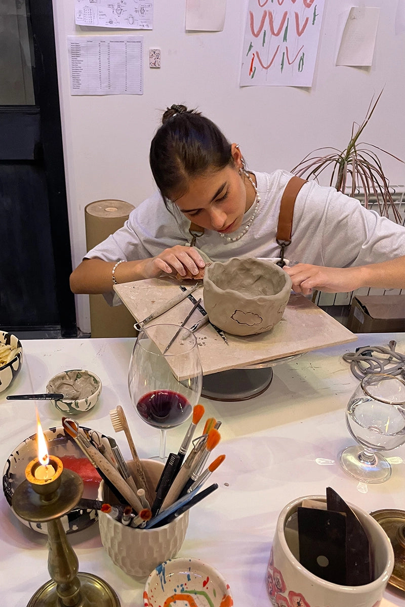 Student making her own ceramic mug at OWO’s pottery workshop in Buenos Aires