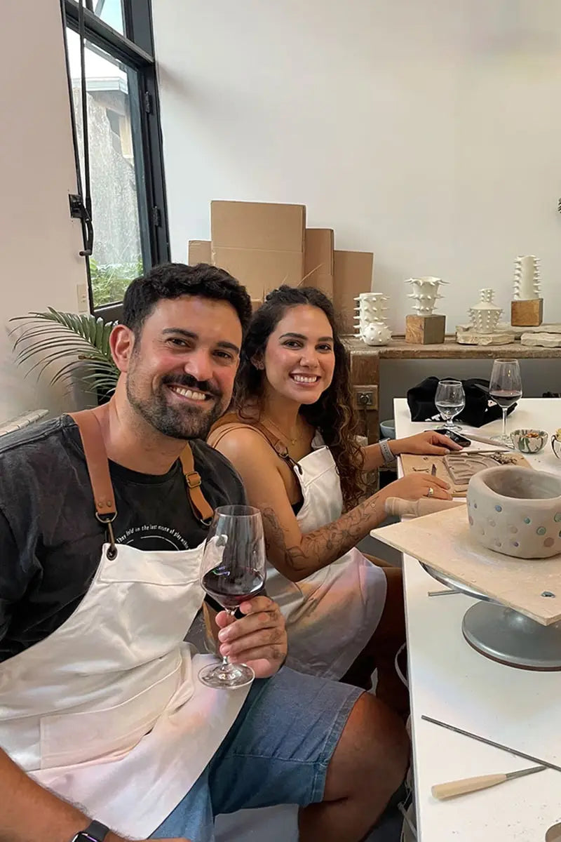 Couple attending OWO’s wine and pottery class in Buenos Aires