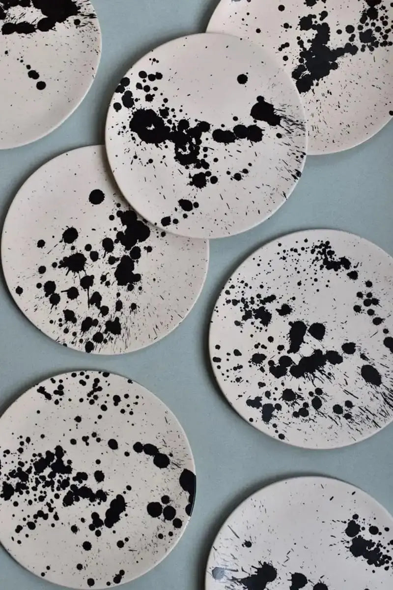 Handmade ceramic dinner plate with hand-painted black splatters by OWO Ceramics