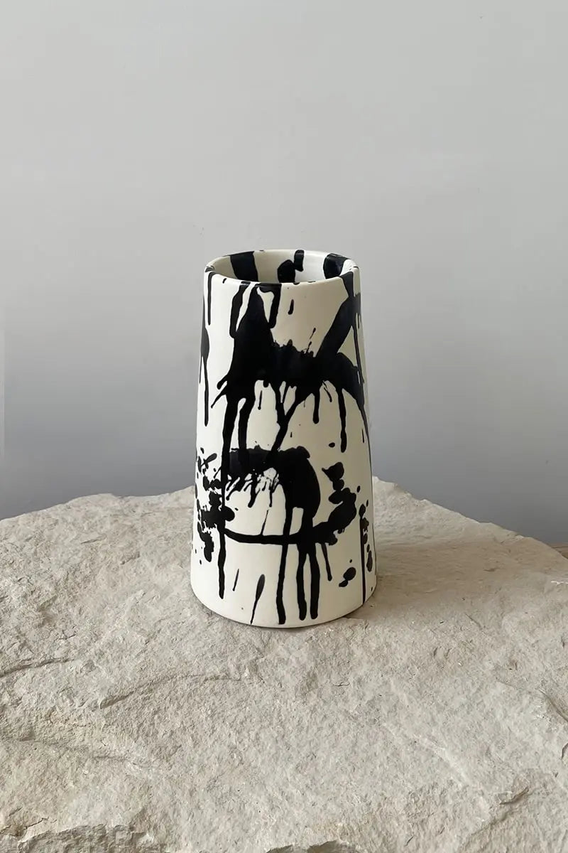 Handmade ceramic flower vase with splatters