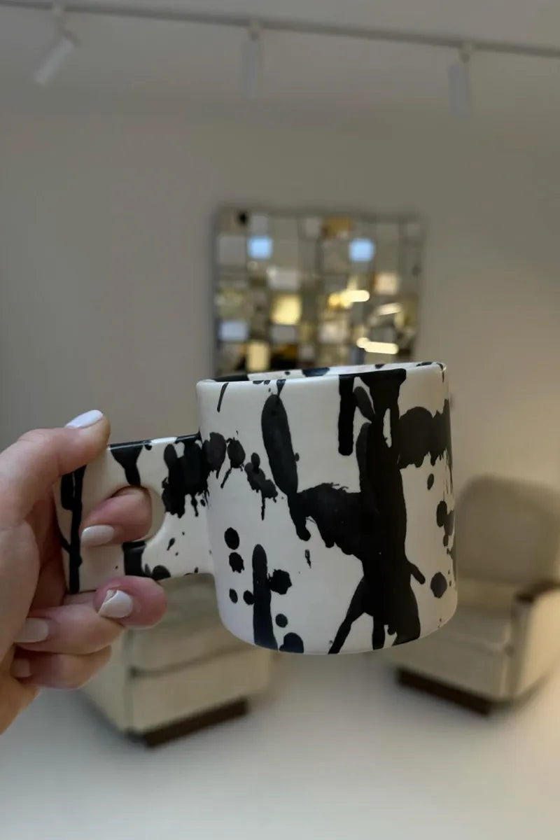 Handmade ceramic mug by OWO Ceramics at use in Atelier Jolie in NYC