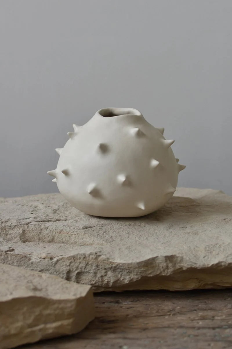 Handmade round white ceramic vase with spikes by OWO Ceramics
