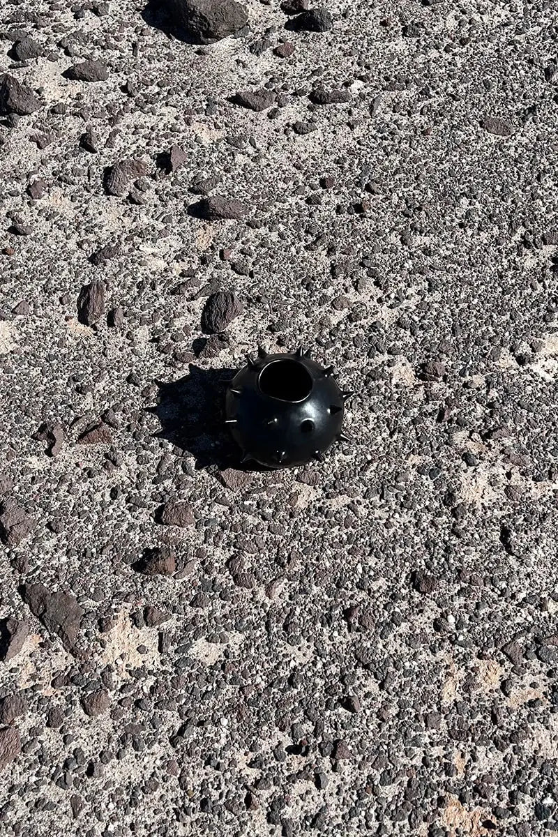 Handmade ceramic black round vase with spikes