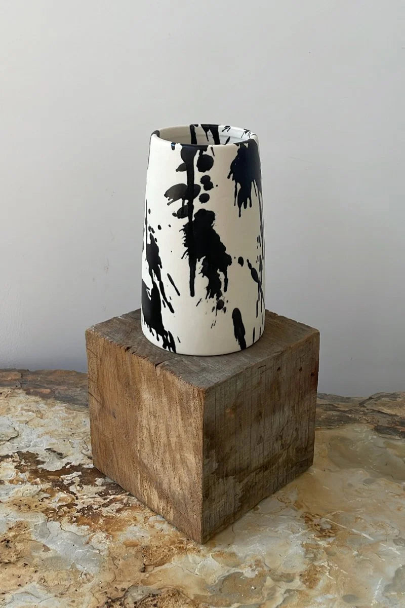 Handcrafted ceramic flower vase with hand-painted black splatters