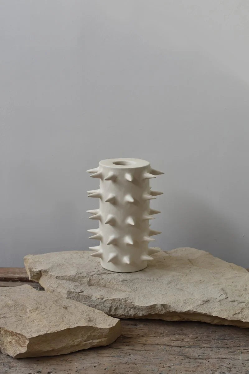 Handmade tall white ceramic vase with spikes