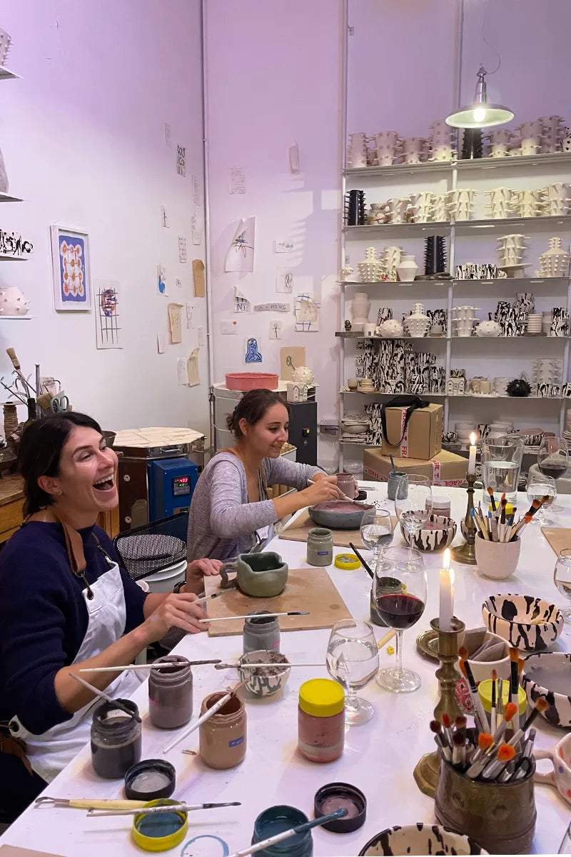 Two students at OWO’s wine & pottery class in Buenos Aires